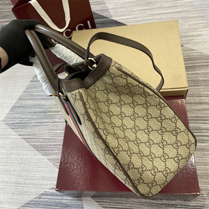 Gucci Ophidia Medium Tote Bag in GG Supreme canvas.