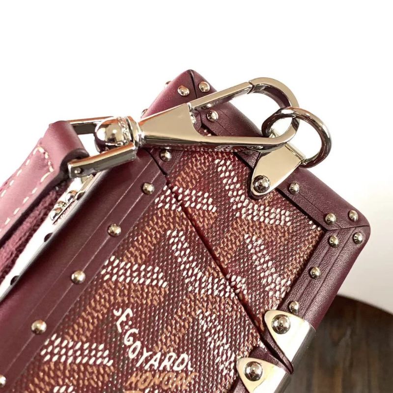 Goyard Cassette Trunk Bag in the rich burgundy