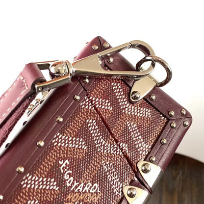 Goyard Cassette Trunk Bag in the rich burgundy