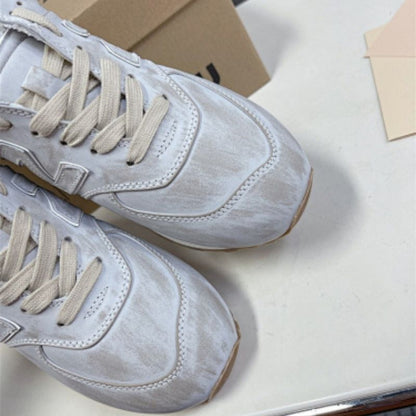 Miu Miu x New Balance 574 Denim sneakers in white