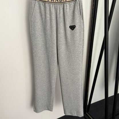 Prada gray two-piece set consisting of a cropped hoodie and matching sweatpants.