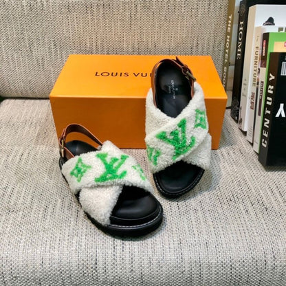 Louis Vuitton Paseo Flat Comfort Sandal with a green logo in shearling