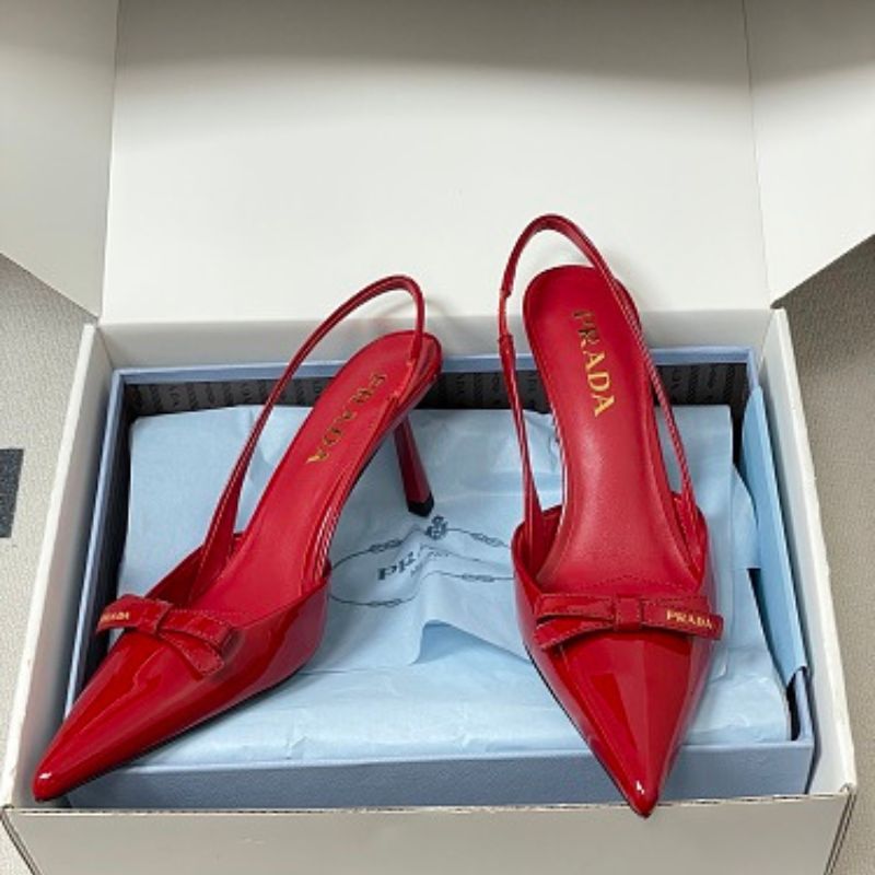 Prada Vernice Patent Leather Bow Slingback Pumps.