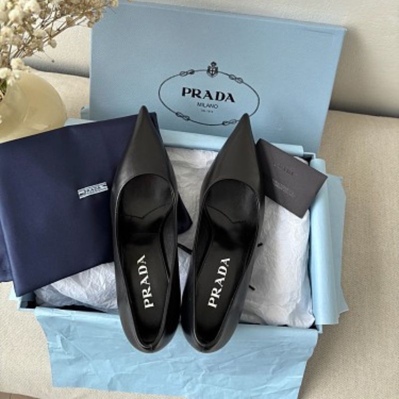 Prada 85mm Pointed-Toe Leather Pumps.