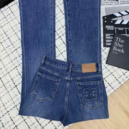 Celine flared denim jeans with a medium blue wash.