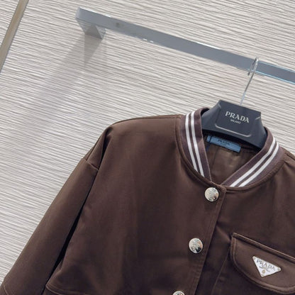 Prada varsity-style bomber jacket in a brown color.