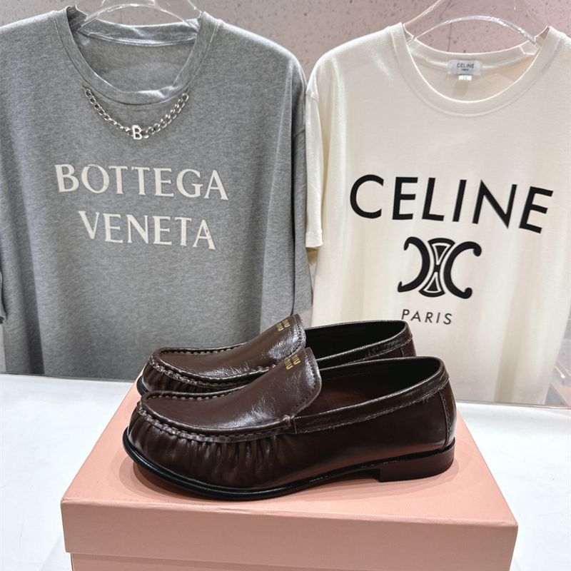 Miu Miu Logo-Embossed Slip-On Loafers