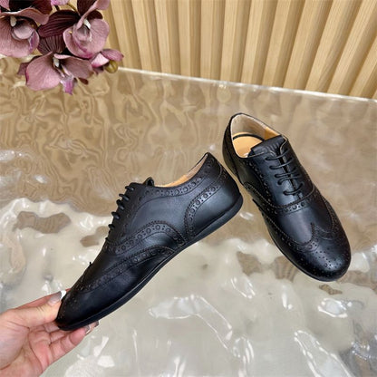 Miu Miu Leather Brogue Shoes.