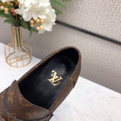 Louis Vuitton Voltaire Loafer in brown monogram canvas