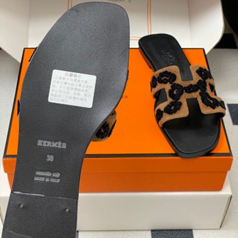 Hermès Oran sandals in a distinctive tricolor leopard-print design