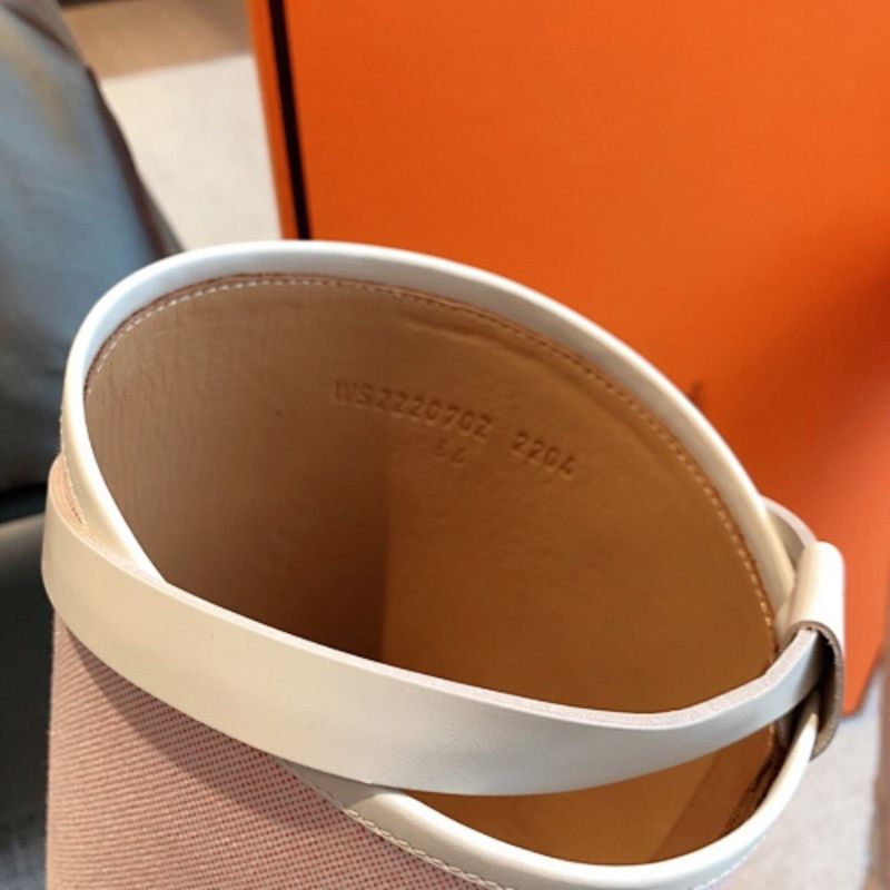 Hermès Jumping Boots in a seasonal pastel pink canvas