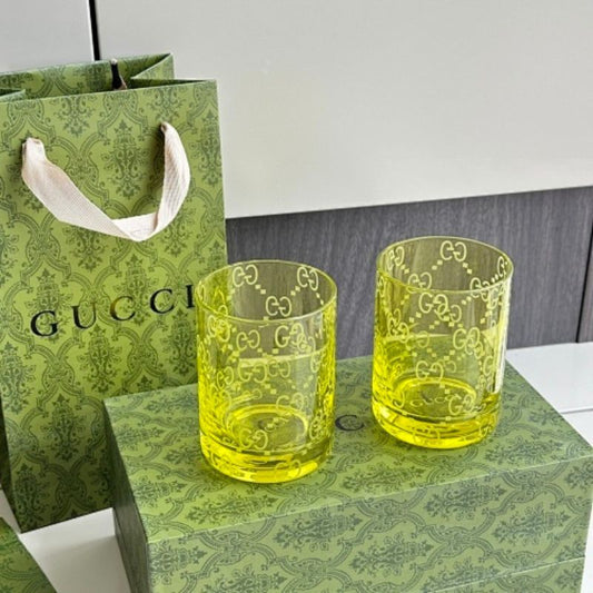 Gucci yellow-tinted crystal tumblers,