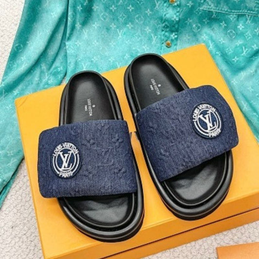 Louis Vuitton Pool Pillow Flat Comfort Mules in blue Monogram denim.