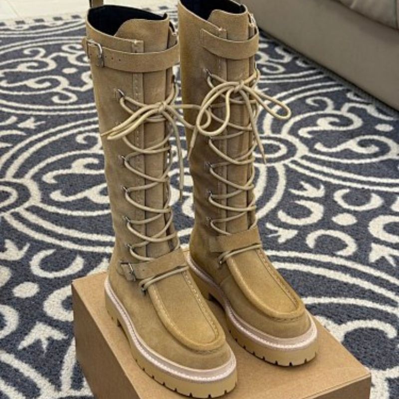Hermès Jumping boots (specifically the lace-up, knee-high variation).