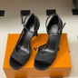 Louis Vuitton Gala Sandals in black.