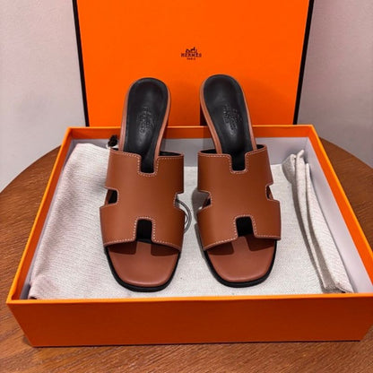 Hermès Oasis Sandals, the elegant heeled counterpart to the iconic Oran flat.