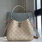 Louis Vuitton's Mahina Leather collection