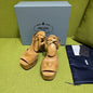 Prada Suede Platform Sandals in a warm camel/tan colorway.