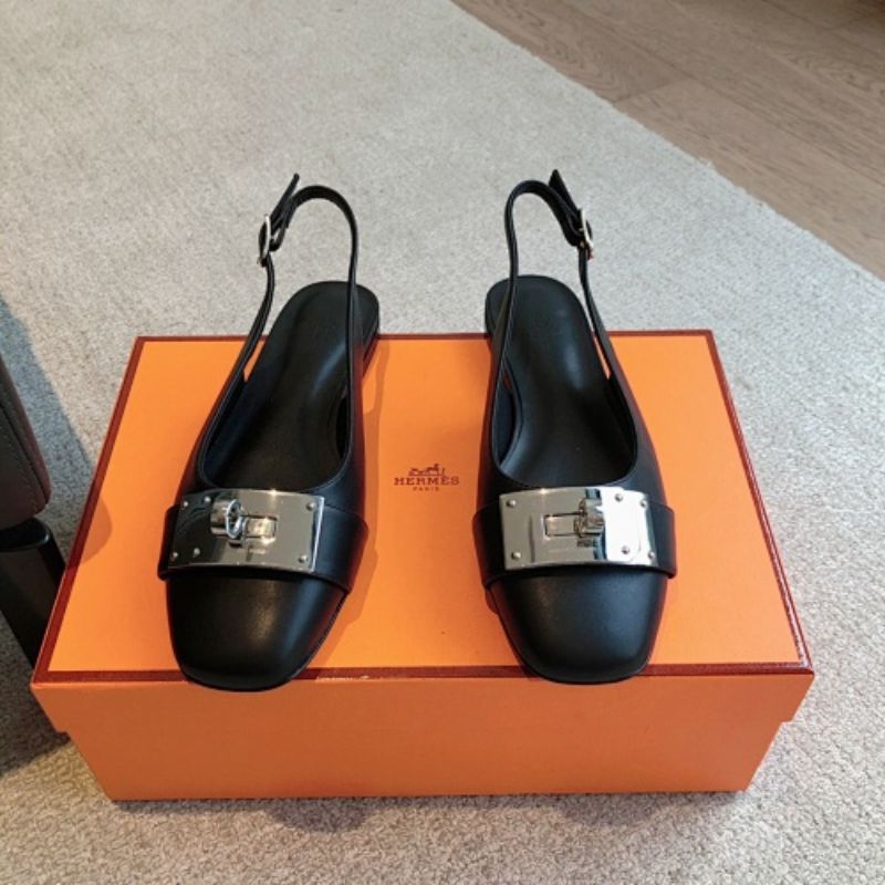 Hermès Innocente Slingback Flats in noir (black) leather,