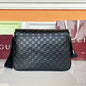 Gucci GG Emblem Medium Crossbody Bag in black embossed GG leather.