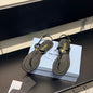 Prada Patent Leather Thong Sandals in classic black ("Nero")