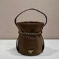 Prada Arqué Re-Nylon and Leather Bucket Bag in a rich cocoa brown.