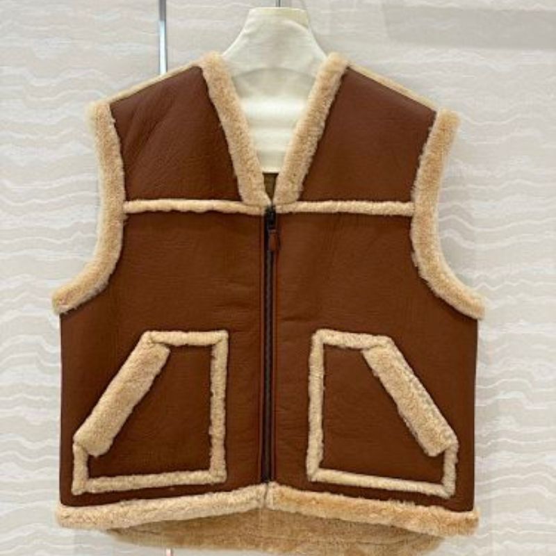 Celine Vintage-Finish Vest in Shearling.