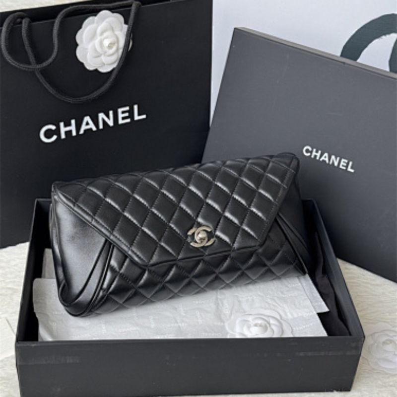Chanel Lambskin Quilted Fold Up Again Clutch.