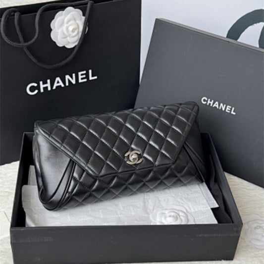 Chanel Lambskin Quilted Fold Up Again Clutch.