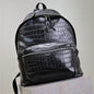 Saint Laurent City Croc-Effect Leather Backpack.