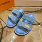 Louis Vuitton Pool Pillow Comfort Mules in blue Monogram denim.