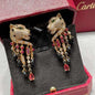 Panthère de Cartier Ruby and Onyx Tassel Drop Earrings,