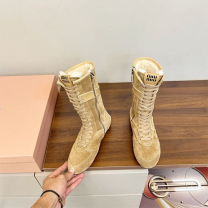 Miu Miu Gymnasium Suede and Shearling Boxer Boots.