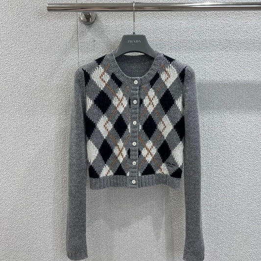 Prada Argyle knit cashmere cardigan in a gray color scheme.