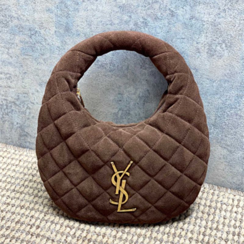 Saint Laurent Icarino a rounded top-handle bag .