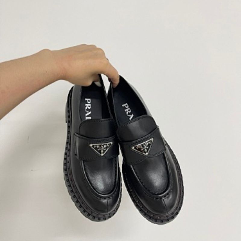Prada Chocolate Brushed Leather Loafers in full black ("Nero").