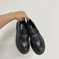 Prada Chocolate Brushed Leather Loafers in full black ("Nero").