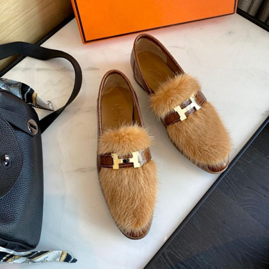 Hermès Cozette Loafers in brown alligator and mink fur.