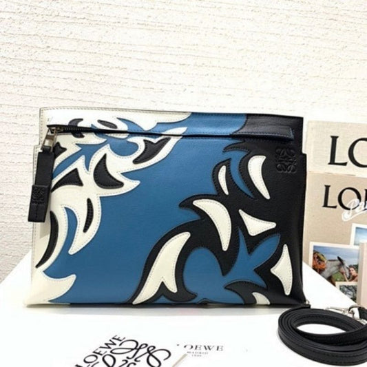 Loewe T Pouch clutch bag in a unique blue, black, and white leather