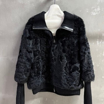 Christian Dior  faux-fur jacket featuring contrasting black knit sleeves, collar, and hem