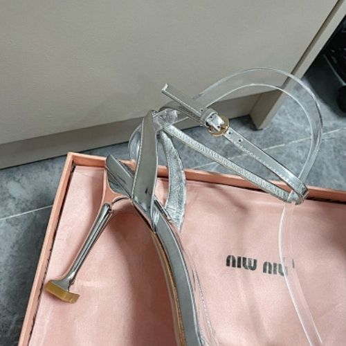 Miu Miu Metallic Leather Sandals with Crystal-Embellished Straps.