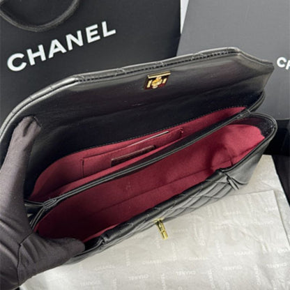 Chanel "Fold Up Again" Chevron Quilted Clutch.