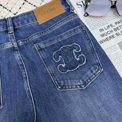 Celine flared denim jeans with a medium blue wash.