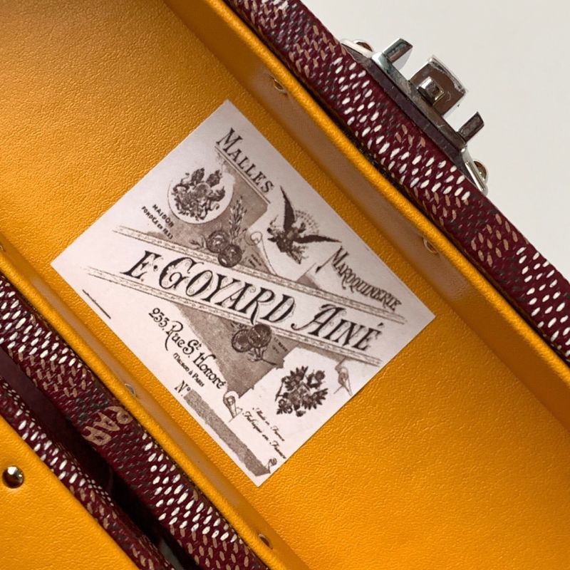 Goyard Cassette Trunk Bag in the rich burgundy