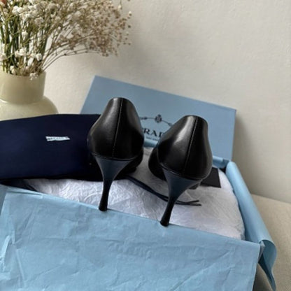 Prada 85mm Pointed-Toe Leather Pumps.