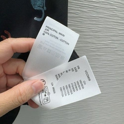 Louis Vuitton "Cats and Dogs" T-shirt in black.