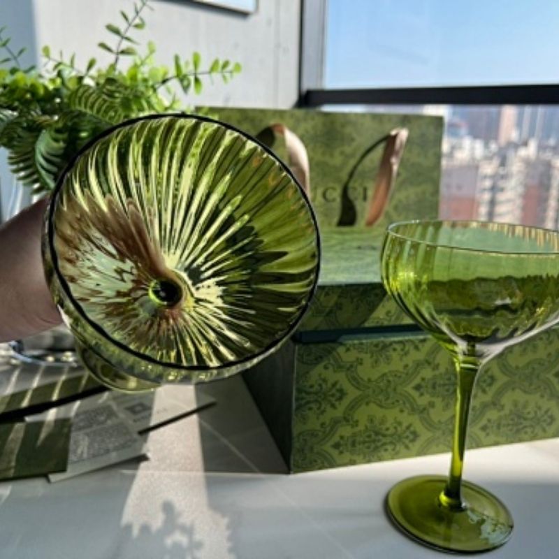 Gucci green-tinted glassware,