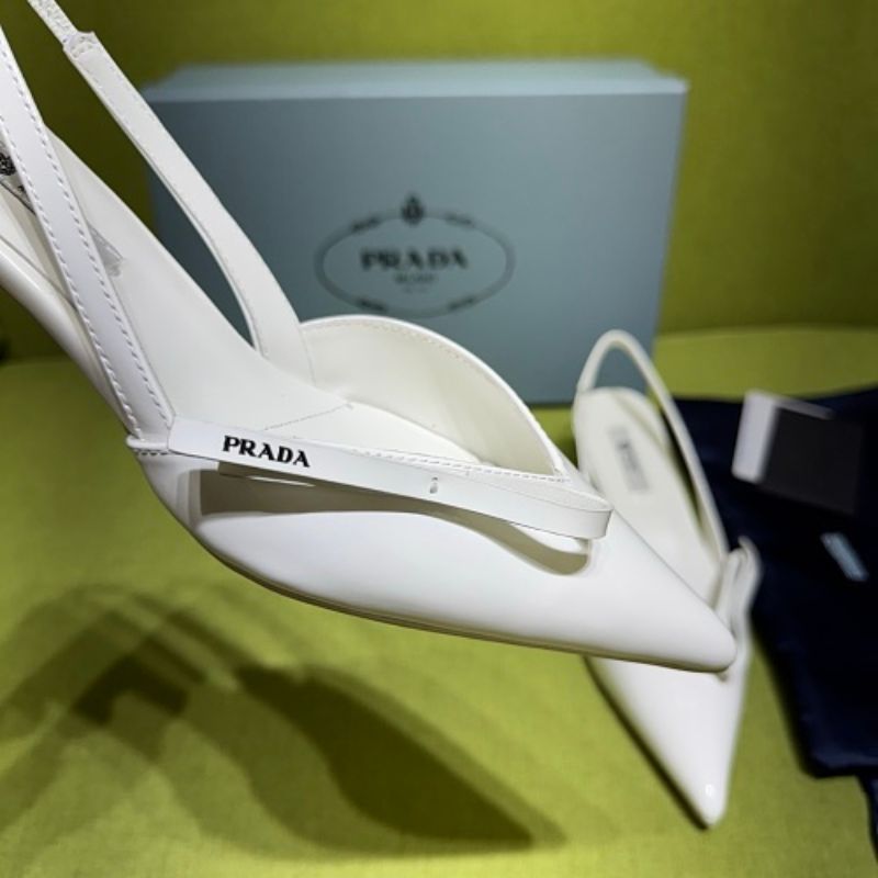 Prada Vernice Patent Leather Bow-Detail Slingback Pumps.