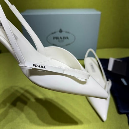 Prada Vernice Patent Leather Bow-Detail Slingback Pumps.
