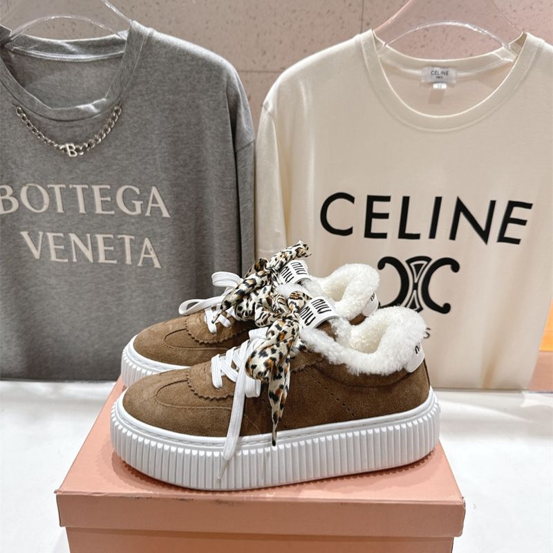 Miu Miu Suede and Shearling Sneakers.